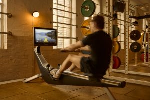 A man on a machine in a gym